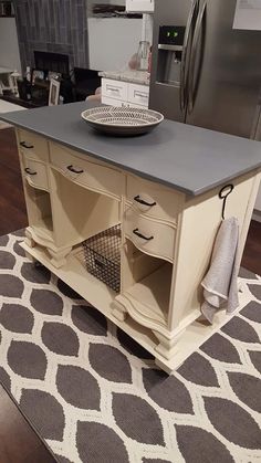 a kitchen island with two baskets on it