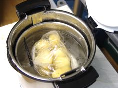 the food is being cooked in the pot on the stove top and ready to be cooked