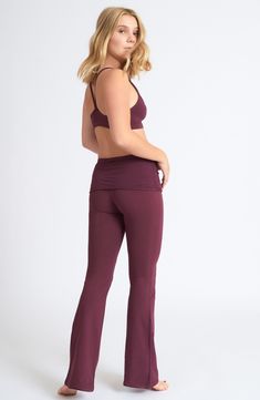 ~Wild Plum~ Active bootleg flare pant.FlatteringShirred waistband. Snug fit.4-way stretch that moves with you and keeps its body-hugging shape. 92% organic cotton 8% lycra. Made in USA. Hand dyed extra soft. Rise: 7.75"Inseam: 33"Colors: Black, White, Navy, Deep Purple, Juniper, Blue Moon, Cognac, Neutral, Sterling, Peacock, Wild Plum Model is 5'6," size 4, and wearing a size small. Shown with the Asana Bralette in Black Bust: 32"Waist: 25"Hips: 33" Wild Plum, Flare Pant, Blue Moon, Flare Pants, Deep Purple, Snug Fit, Hand Dyeing, Bralette, Organic Cotton