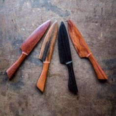 three different types of knives on a table