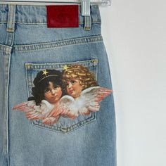 Fiorucci Angels Patch Tara Jeans Light Vintage Brand New Without Tags - No Faults Size: 25 Women’s Angels Patch Tara Jeans In A Light Vintage Wash, Featuring The Fiorucci Angels Patch On The Back Pocket. The Tara Jeans Are High-Waisted With A Tapered Leg, An Iconic 5-Pocket Design, Waistband With Belt Loop And A Button And Zip Fly. Hand-Crafted From Premium Denim Made Of Organic Cotton. Slim Fit Tapered Leg High Waist Belt Loops With Button And Zip Fly Closure 5-Pocket Style Originally $260 Fiorucci Jeans, Fiorucci Angels, Customized Jeans, 2000s Room, Angel Jeans, Danny Brown, Cool Jeans, Winter Fits, Jeans Light