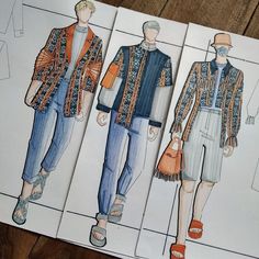 three paper dolls with different outfits on them, one in blue and the other in orange