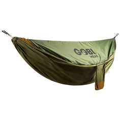 a large green hammock hanging from the ceiling