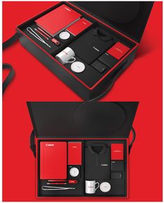 an open black box with red items in it on a red background and the contents inside