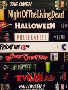 a stack of halloween movies stacked on top of each other