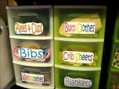 plastic bins with labels that spell out places and clips to put name tags on them