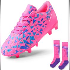 a pair of pink and blue soccer shoes with purple socks on the bottom, next to it