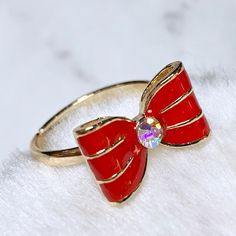 Brand New Gold Tone Bow Ring In Red. Adjustable Size. Trendy Red Party Rings, Cute Adjustable Rings For Parties, Cute Adjustable Party Rings, Adjustable Cute Party Rings, Cute Red Round Jewelry, Cute Round Red Jewelry, Cute Party Ring Jewelry, Cute Red Ring As Gift, Cute Red Ring For Gift