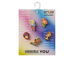 three pin badges with cartoon characters on them