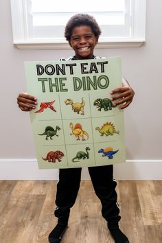 "Make your child's dinosaur birthday party or school class party unforgettable with our exciting spin on the classic game, Don't Eat Pete! Introducing \"Don't Eat The Dino!\" - the ultimate party game for kids that will have everyone laughing and having a blast. With your purchase, you'll receive a high-quality, full-color 16x20 poster game board shipped flat straight to your doorstep. But wait, there's more! Your package doesn't just include the high-quality game poster board, it also comes with a custom Dinosaur blindfold that matches the game perfectly. After the party is over, the blindfold can be used as a sleep mask, making it the perfect party favor for your birthday child! In addition to the game board and blindfold, you'll also receive detailed game instructions to ensure that you Dino Party Games, Party Game Board, Poster Game, Dinosaur Party Supplies, Birthday Party Game, Dinosaur Themed Birthday Party, 16x20 Poster, Color Poster, Board For Kids