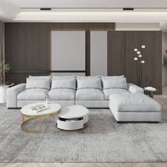 a large white couch sitting in a living room on top of a carpeted floor