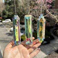 PRICES MAY VARY. This crystal pendants are made by hand,Length 4.7 inches.Hanging them in a sunny room and watch your personal rainbow appear and enjoy it. We have provided you with metal hooks cord for easy hanging to wherever you like such as garden, backyard,window,porch,balcony,tree,plants,car rear view mirror. As a gift on Valentine's Day,Mother's Day,Wedding,Birthday,Thanksgiving,Christmas, these great rectangle crystal suncatcher decor are good choice. The crystal balls prisms combined with chains are colorful shining. Each hanging crystal sun catcher presents a beautiful and unique color. These charming shiny ornaments will brighten up your place and create pretty rainbows under the natural light. The set includes 3 pieces of colorful crystal suncatcher chain, Each one can meet you Suncatcher Decor, Hanging Suncatchers, Window Porch, Crystal Room Decor, Sunny Room, Prism Rainbow, Glass Prism, Crystal Room, Hanging Crystal