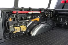 the interior of a vehicle with various tools in it