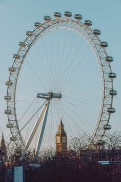 the big ben clock tower towering over the city of london