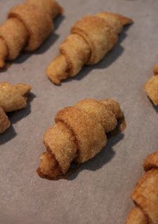 some food that is laying out on a baking sheet and ready to be baked in the oven