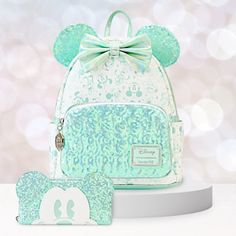 This Listing Is For Both The Loungefly Mini Backpack And The Matching Wallet Celebrating Disney's 100th Anniversary Sold Exclusively At Hallmark. It Is A Beautiful White With Minty Green Iridescent Sequins And Iridescent Minty Green Disney Character Faces Decorating The Bag. Bag Is New With Tags And Never Used. Kept In A Smoke-Free Home Away From Pets In Their Bag. Disney 100th Anniversary, Monochromatic Style, Loungefly Mini Backpack, Disney Face Characters, Disney 100, Disney Decor