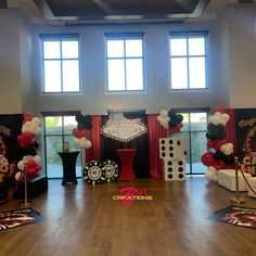 a party hall decorated with balloons and decorations for a mickey mouse themed birthday celebration at disney's hollywood studios