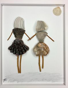 Two ladies/friends/sisters is a larger piece at 8x10" on the vertical. Ladies are in adorable outfits including lady on the left in a Lions Paw skirt (shell from Holden Beach, NC). Top is part of a pen shell. Hair on left is blond/white and on right, brown/gray. Other shells from SC beaches. Sun upper right corner. Finished piece is about 8.5 x 8.5." White frame can stand or be hung. Each piece I make is unique. It makes a perfect gift for sister/friends/girls/mom or best friend. Send me a msg i Art With Paper Creative, Shell Pictures Art, Seashell People Art, Broken Shell Crafts, Shell People Art, Things To Do With Seashells, What To Do With Seashells, Sister Gifts Ideas, Art With Shells