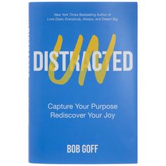 a blue book with the title distilled capture your purpose rediscover your joy