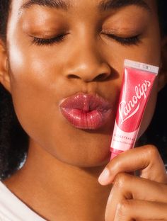 It's a mega-gloss to fix dry lips! Gloss over dry lips with Lanolips GLOSSY BALMS. For those who want natural, ultra-hydrating and mega-gloss, meet the Lanolips GLOSSY BALMS. The GLOSSY BALMS range comes in two sweet, all natural flavors: Candy: A fruity pink balm with added gold for extra gloss-up. Berry: A punchy berry-jam glaze for the perfect pout. GLOSSY BALMS in Candy is a fruity pink balm enriched with our all-natural lanolin, that smooths over dryness, seals in moisture and drenches lips Lips Gloss, Berry Jam, Two Sweet, Molecular Structure, Dry Lips, Lip Care, Lovely Colors, Pretty Colours, Natural Flavors