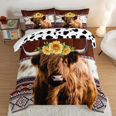 a cow with sunflowers on its head is shown in this bedding set