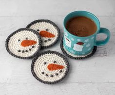 three crocheted coasters and a cup of coffee