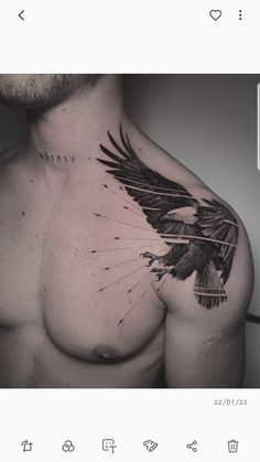 a man's chest with an eagle tattoo on it