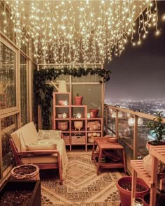 an image of a living room with lights hanging from the ceiling and furniture on the floor