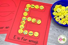 the letter e is for emoji and it's made out of buttons