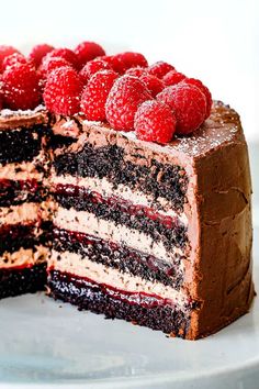 a chocolate and raspberry layer cake on a plate