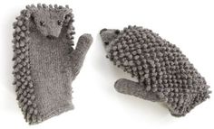 two knitted hedge mittens sitting next to each other