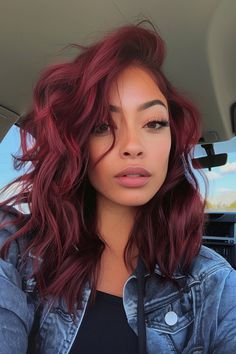 Discover our selection of stunning burgundy hair color ideas you'll want to copy now. From the sexy raspberry red hair color on shoulder-length waves you see here to rich mahogany shades on long layers and dark plum tones on short cuts, we've got over 40 beautiful color ideas on our blog. Tap the pin to see all of them now and follow us for more hair color and hairstyles inspo! Burgundy Hair With Lowlights, Red Hair Color On Short Hair, Hair Color Ideas Burgundy, Burgundy Hair Mid Length, Red Hair At Home, Hair Trim Ideas, Burgundy Hair Medium Length, Red Raspberry Hair Color, Cool Color Hair