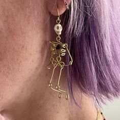 These spooky, scary skeleton earrings  are perfect for every Halloween ghoul or goblin.  Skeletons are hand fashioned out of solid brass wire. Earrings hang approx. 3.5" long.  Skeletons are topped in a carved howlite skull.  Skeletons are finished with a red garnet heart set in the enclosed ribcage.  Arms and legs can be bent to preferred position.  Skeletons hang from choice of matching nickel free hypoallergenic brass ear wires with silicone push back closure (pictured) or gold plated silver Goblin Skeleton, Spooky Scary Skeleton, Brass Wire Earrings, Wire Skeleton, Scary Skeleton, Spooky Skeleton, Garnet Heart, Skeleton Earrings, Skeleton Halloween