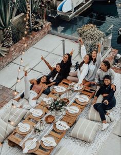 a group of women sitting around a table