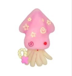 a small pink toy with stars on it