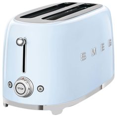 the smegle toaster is white and has two black knobs on it