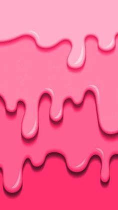 pink liquid flowing down the side of a piece of paper that has been cut into smaller shapes