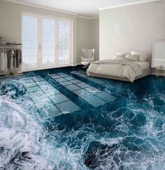 a bedroom with blue and white flooring that looks like it is floating in the ocean