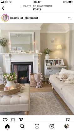 a living room filled with furniture and a fire place