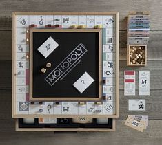 a monopoly board game with dices and cards