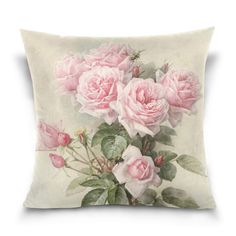 a pillow with pink roses on it