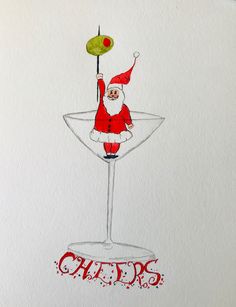 a drawing of santa claus in a martini glass with the word cheers painted on it