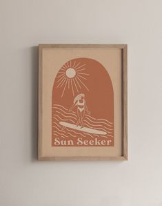 the sun seeker is hanging on the wall