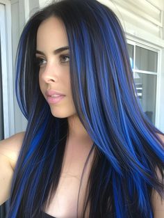 Last but not least, electric blue highlights are for the adventurous at heart. This vibrant color makes a powerful statement and can be applied as streaks or layered throughout for a more immersive effect. Best suited for dark hair, it’s a style that pairs well with bold fashion choices and creative personalities. Royal Blue And Black Hair, Black Hair With Royal Blue Highlights, Blue Hair Highlights For Brown Hair, Blue Highlights In Dark Hair, Navy Blue Hair Color Highlights, Blue Highlights In Dark Brown Hair, Blue Chunky Highlights In Brown Hair, Blue Hair Color Ideas For Short Hair, Layered Blue Hair