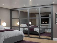 a bedroom with mirrored doors and a bed in the middle, surrounded by purple rugs