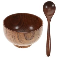 a wooden bowl and spoon on a white background