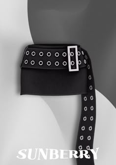 a black and white photo with the sunbury logo on it's belt strap