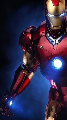 an iron man standing in front of a dark background