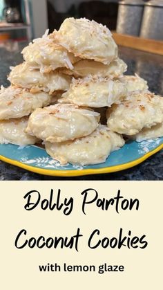 a blue plate topped with coconut cookies on top of a counter