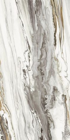 an abstract marble pattern with brown, white and grey colors on it's surface